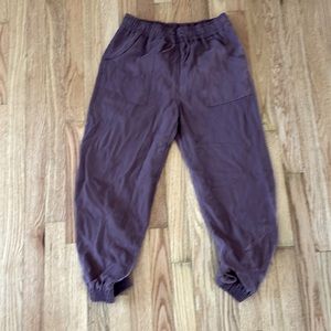 Purple Zara joggers with a drawstring in pockets in the front and back
